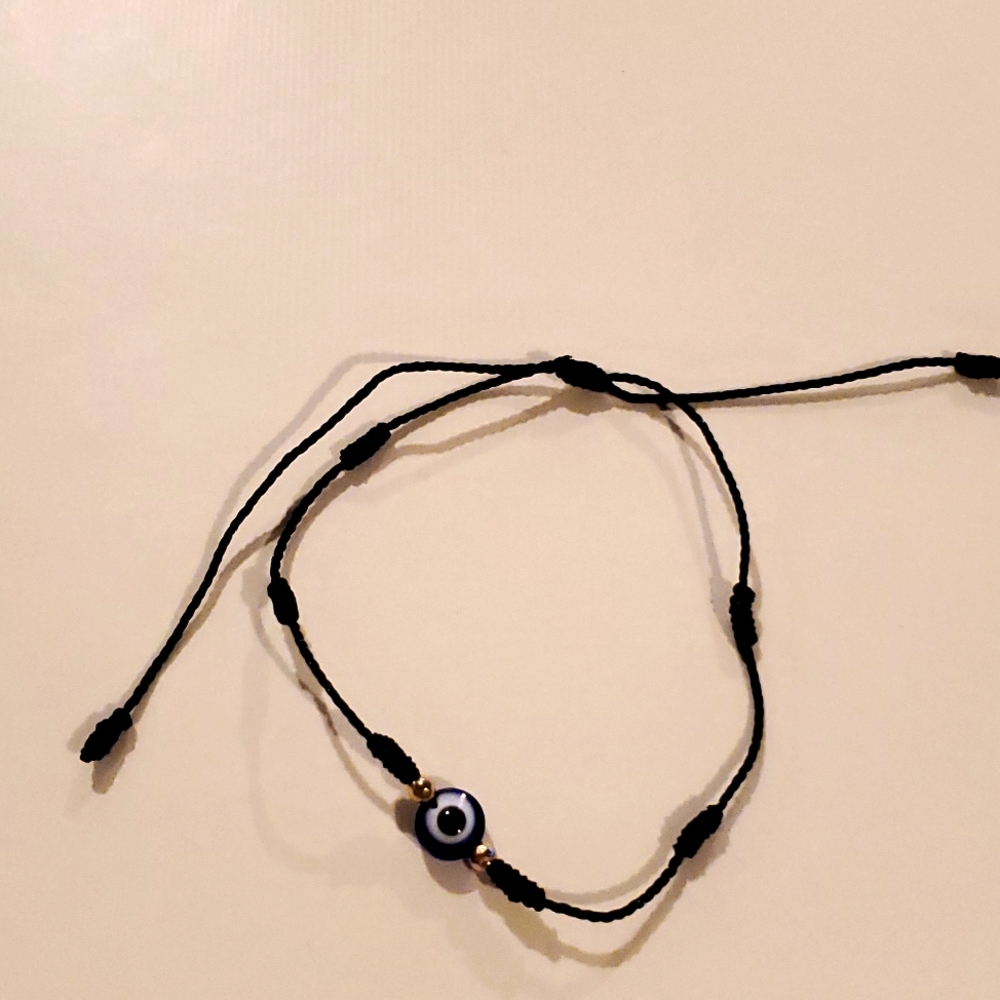 Evil eye bracelet with black string